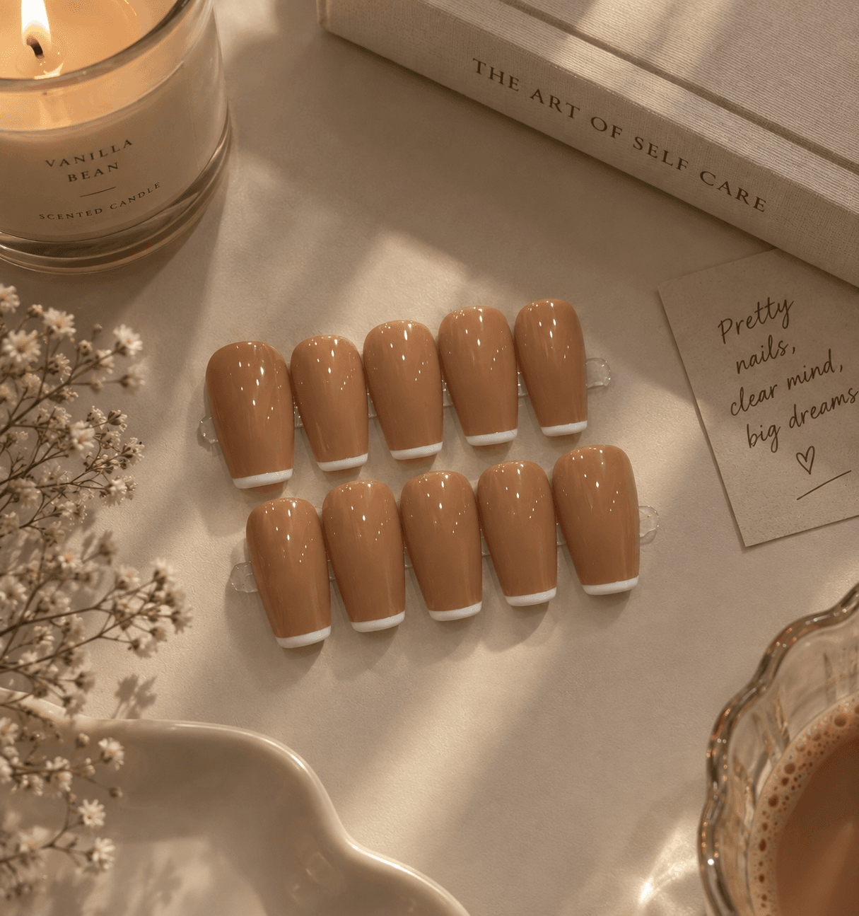 Caramel Latte - L size — Glossy caramel-nude nails with a thin white micro French tip, on a classic coffin shape.