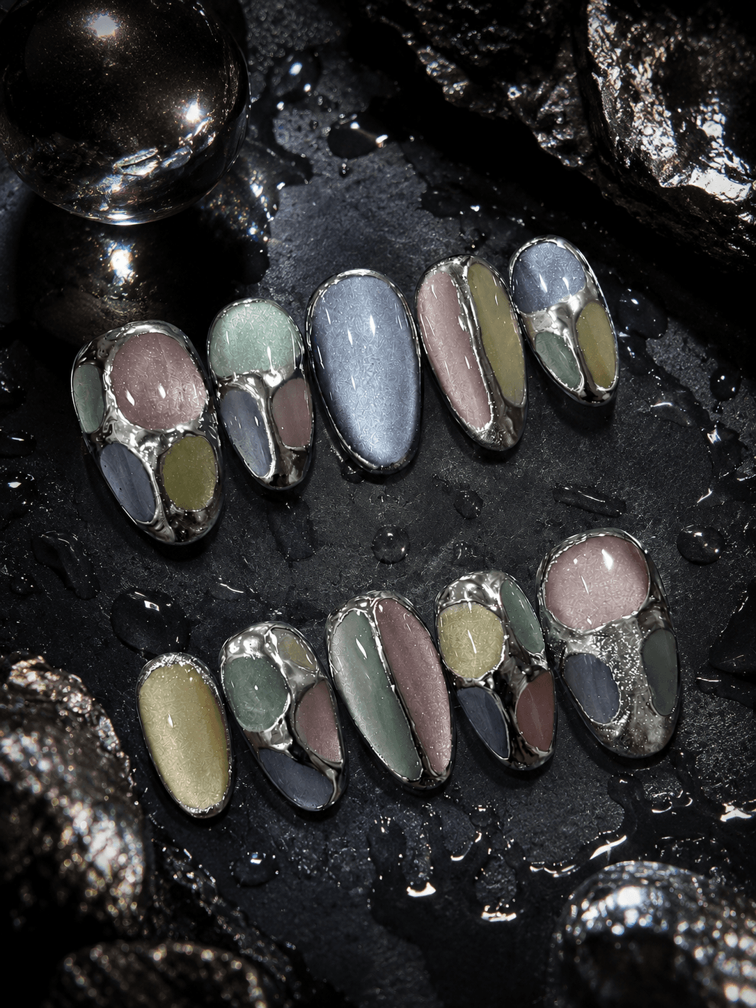 Cat Eye Chrome Mosaic — Pastel cat-eye patches in lilac, sage, mustard, and dusty blue, framed in chrome for a stained-glass mosaic effect.