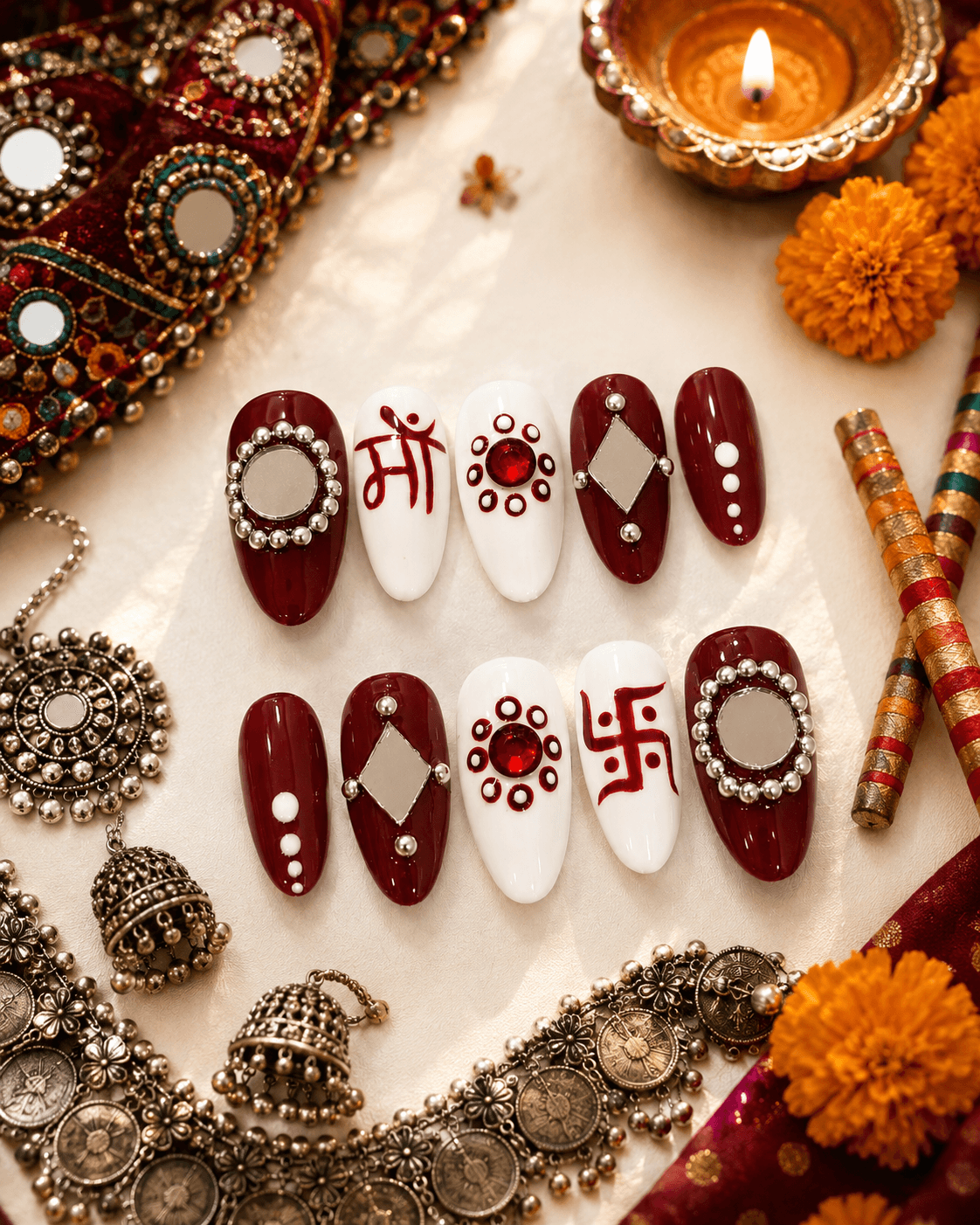 Deep Maroon with Mirrors — Festive maroon & white press-ons with mirror work, silver beading, and sacred symbols.