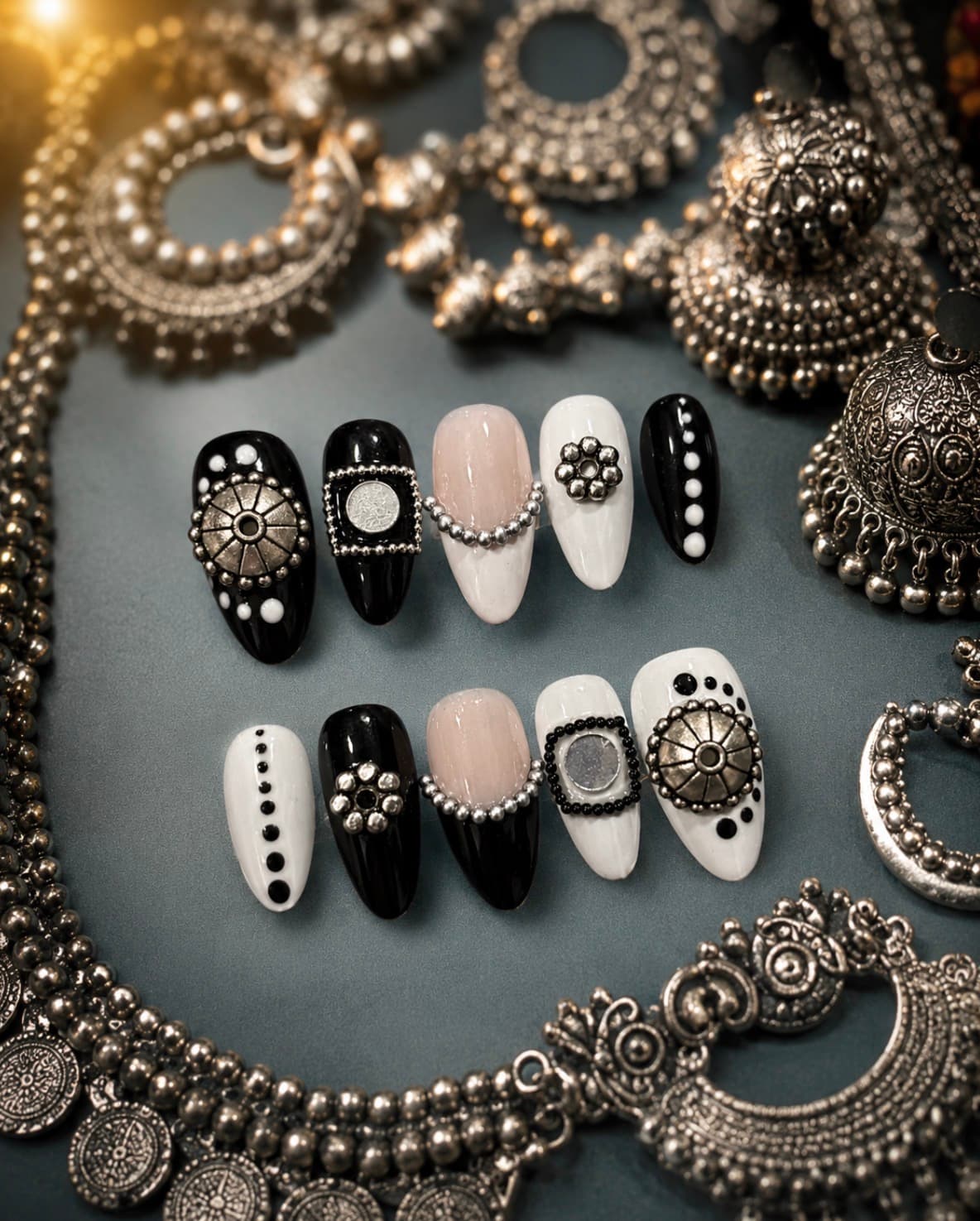 Oxidised Edit — Black, white & blush nails with oxidised silver coin charms and dots.